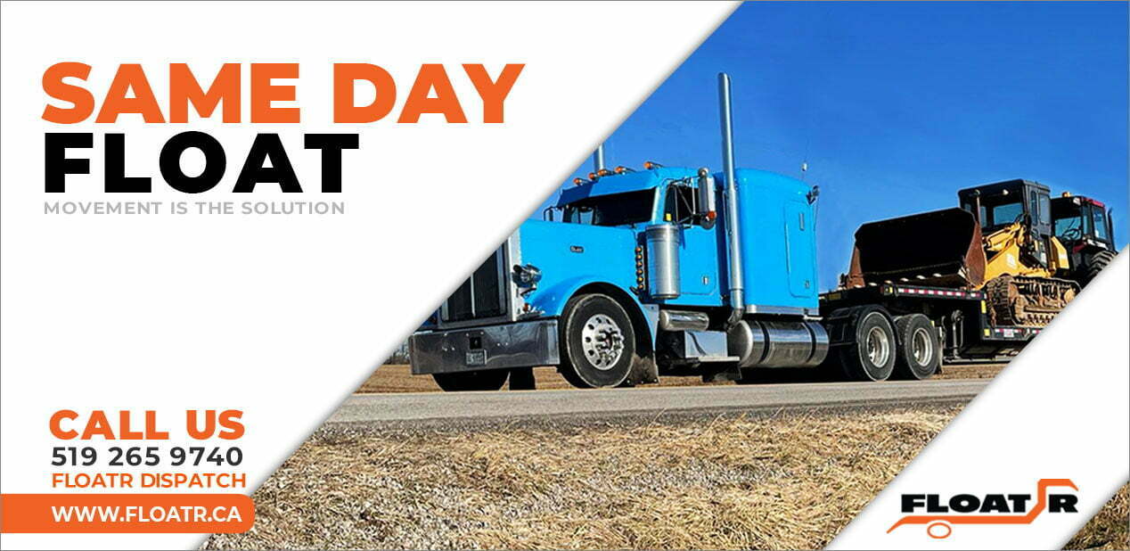 Transport truck hauling heavy machine