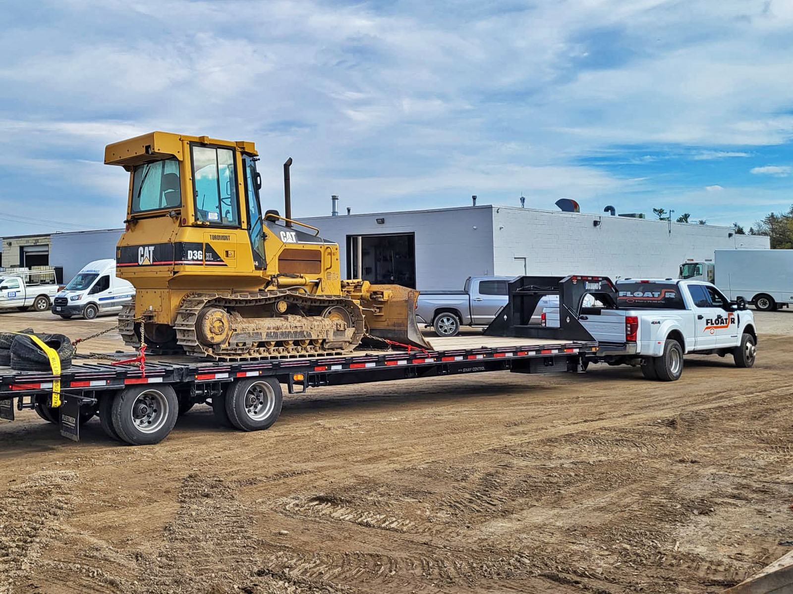 Industries That Rely On Flatbed Trucking Ontario Toronto Guelph   Xbulldozer Transport Guelph .pagespeed.ic.eZuHUjTieY 