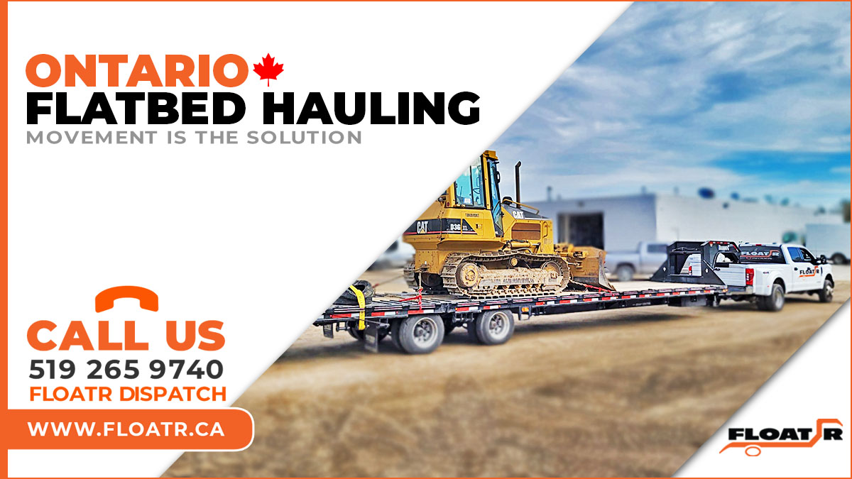 Ontario Flatbed Hauling an excavator towards Hamilton